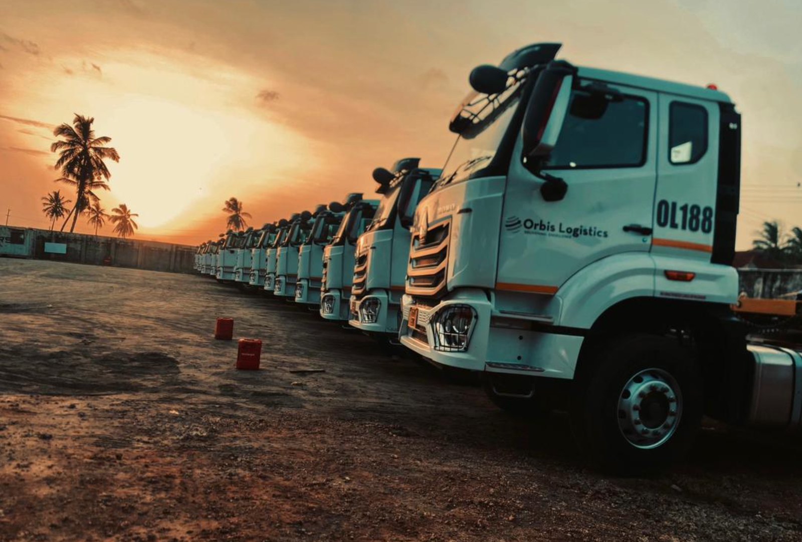 Orbis trucks at sunset